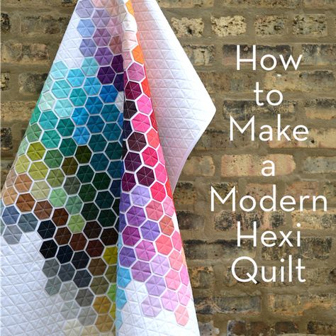 Are you a quilter? Please make this modern hexi quilt - it's so pretty! Hexagon Quilt Tutorial, Quilt Hanging, Hexagon Quilt Pattern, Geometric Rainbow, Hexagon Quilts, Hexie Quilt, English Paper Piecing Quilts, Quilt Modernen, Rainbow Quilt