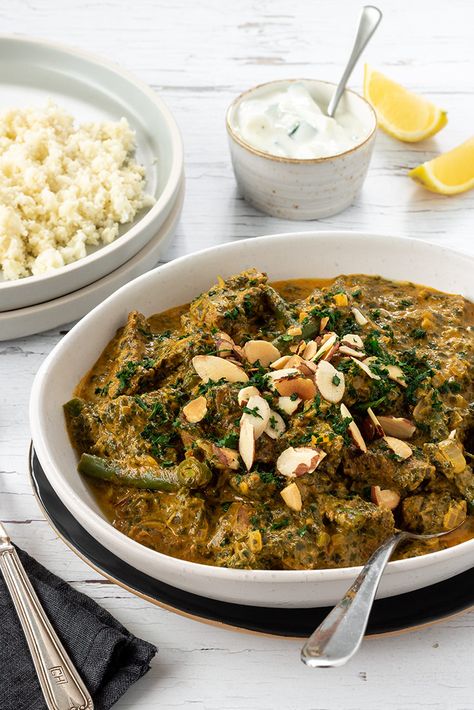 This creamy lamb saagwala is a lightly spiced curry that’s a great way to eat your greens - it tastes better than it looks! It’s lower in carbs too, thanks to the addition of cauliflower rice. Naan bread optional! Lamb Saag, Gluten Free Naan, Gluten Free Pita, Green Curry Recipes, Curry Recipes Indian, Recipe Cover, Naan Bread, Green Curry, Frozen Spinach