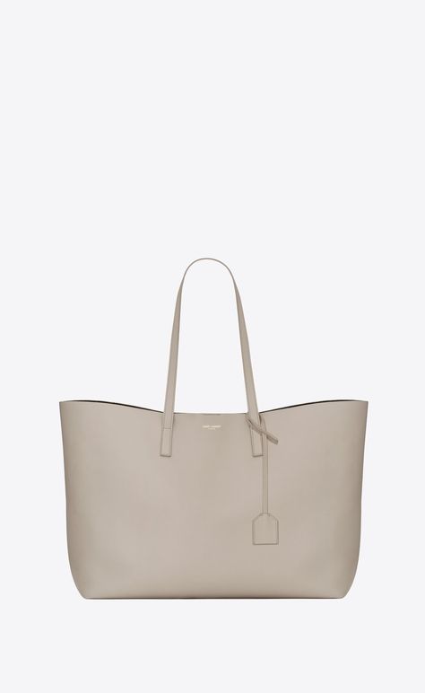 Shopping bag saint laurent e/w in supple leather | Saint Laurent United States | YSL.com Designer Work Bag, Stylish Work Bag, Saint Laurent Tote, Best Designer Bags, Vintage Ysl, Zip Purse, White Tote, Work Bags, Leather Shops