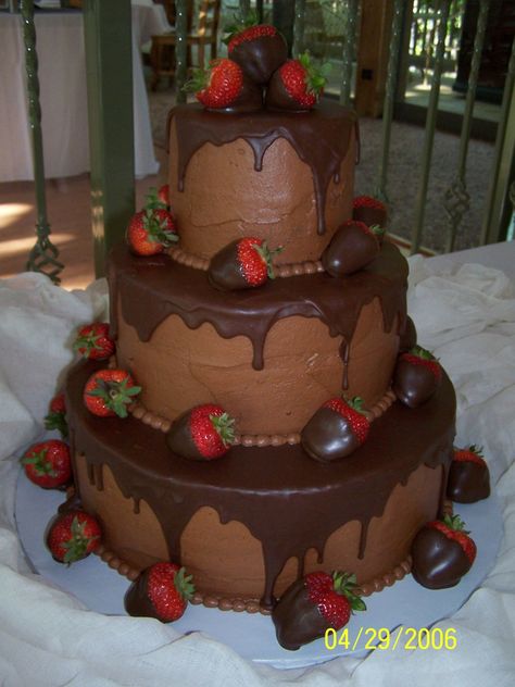 3-tiered Chocolate Cake with Dipped Strawberries - Made this for a 50th wedding anniversary.  Triple Chocolate Fudge Cake with Chocolate Buttercream and that Betty Crocker Pour and Frost icing on top.  It's a 6"-10"14" - each tier is about 4 1/2 inches tall. Cake With Dipped Strawberries, Triple Chocolate Cake, Dipped Strawberries, Wedding Cake Recipe, Chocolate Wedding Cake, Chocolate Fudge Cake, Fudge Cake, Strawberry Dip, Strawberry Cakes