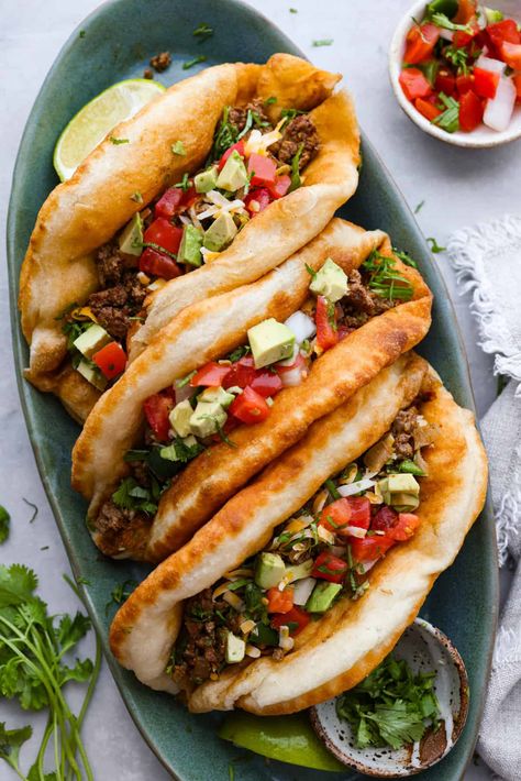 All your favorite taco fixings inside a warm, fluffy piece of fried bread! Homemade chalupas are a knockout dinner the whole family will go crazy over. Homemade Chalupas, Chalupas Recipe, Chalupa Recipe, Taco Fixings, Slow Cooker Jambalaya, Ricotta Meatballs, Fried Bread, The Recipe Critic, Family Unit