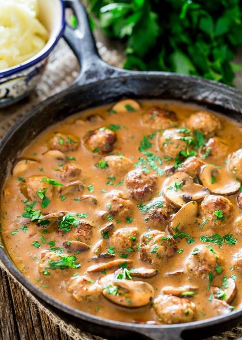 Meatballs with Mushroom Sauce - pork meatballs in a delicious creamy mushroom sauce served over mashed potatoes. Comforting and incredibly delicious! Mushroom Meatballs, Meatballs And Gravy, Over Mashed Potatoes, Ground Pork Recipes, Jo Cooks, Pork Meatballs, Meatball Ingredients, Creamy Mushroom Sauce, Cream Of Mushroom