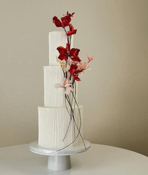 Peggy Liao Cake on Instagram: "This ribbed texture has been requested by many of my brides and the design was elevated with pop of red, simple but graceful ❤️ my pleasure to create this for V & A last weekend!" Ribbed Wedding Cake, Sangjit Cake, Red White Wedding Cake, Simple Red Velvet Wedding Cake, Wedding Cake Texture, Red Flower Cake, Wedding Red Velvet Cake, Red Floral Cake, Red Flower Wedding Cake