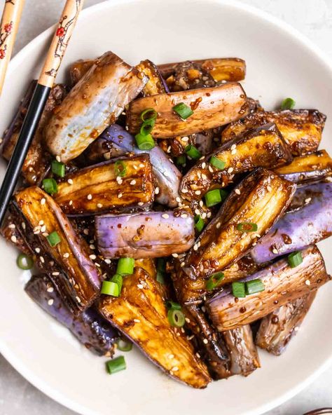 This Chinese eggplant stir-fry features juicy pan-fried eggplant cooked in a flavorful and rich sauce. A simple meatless side dish that is easy to prepare and ready in 30 minutes. Even veggie haters will love this dish! Chinese Eggplant Recipes Stir Fry, Chinese Eggplant Recipes, Pan Fried Eggplant, Eggplant Stir Fry, Chinese Eggplant, Cooking Eggplant, Fried Eggplant, Stir Fry Sauce, Healthy Recipies