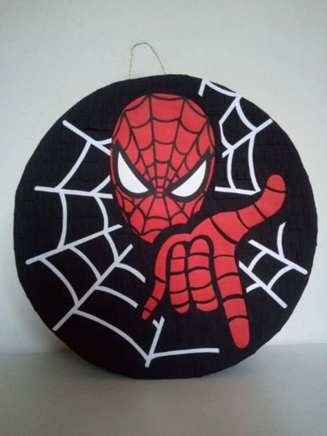 Spiderman Piñata. To fill with small toys or sweets through the opening at the top and to hang using its little string. Diameter: 50 cm All my Piñatas are made by hand and in order to guarantee a high quality product, my Piñatas are made to order. For the little ones and on request, it is possible to make it with strings. Spiderman Pinata, Pinata Ideas, Piñata Ideas, Small Toys, Crepe Paper, Wedding Basket, Toys Games, Spiderman, The Top