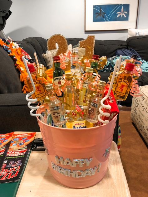 Made this bucket for my friends 21st birthday, super fun! Bucket, styrofoam, and stuffing is from michaels. I used chop sticks from Walmart for the shooters and "21". Stuffed in some candy, swirly straws and shot glasses! She loved it! 21st Bday Shooters Gift, Swirly Straws, Diy 21st Birthday Gifts, 21st Birthday Gifts For Best Friends, Beer Pong Table Diy, 30th Ideas, 21st Presents, 21 Bday, Bucket Gifts