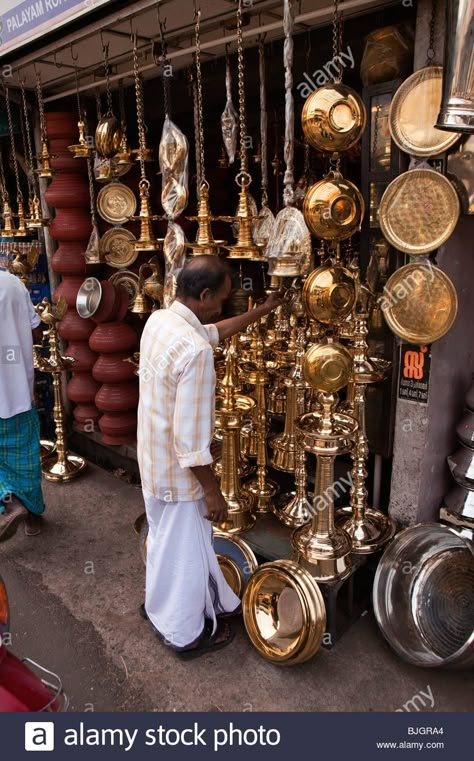 Download this stock image: India, Kerala, Calicut, Kozhikode, Palayam Road, Copper Bazaar, man at shop selling brass and stainess steel items - BJGRA4 from Alamy's library of millions of high resolution stock photos, illustrations and vectors. Copper Interior, Diwali Decorations At Home, India Home Decor, Ethnic Home Decor, Brass Items, Pooja Room Door Design, Pooja Room Design, Room Door Design, Puja Room