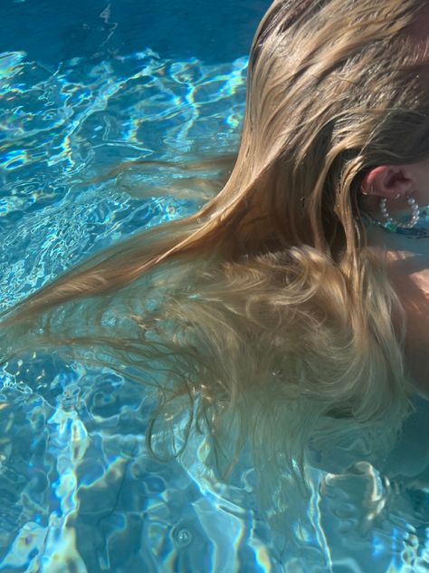 crystal clear blue water with small rainbow ripples. blond wet hair flowing in the water with a stillness and calming  vibe on a sunny day. Blue Mermaid Aesthetic, Underwater Hair, Crystal Blue Water, Hair Flowing, Pretty Blonde Hair, Mermaid Wallpapers, Art Assignments, Water Aesthetic, Water Pictures