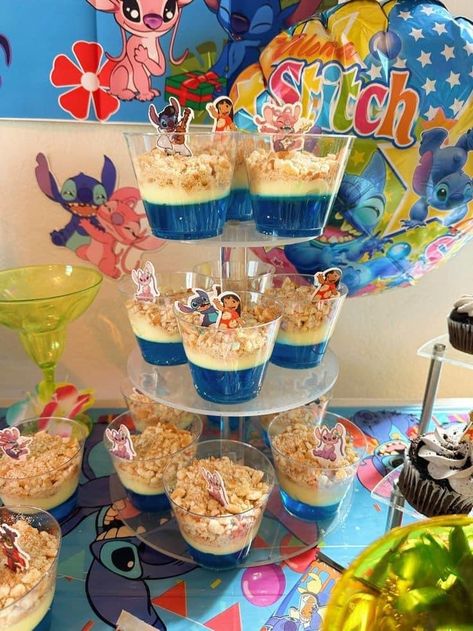 Stitch Party Snacks, Stitch Treat Ideas, Stitch Themed Party Food, Lilo And Stitch Treat Table, Stitch Day 626 Party, Lilo And Stitch Birthday Party Food Ideas, Lilo And Stitch Party Snacks, Lilo And Stitch Rice Krispie Treats, Lilo And Stitch Themed Birthday Party Food