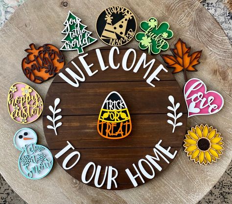 "*CHECK OUT OUR SHOP PAGE FOR MORE INTERCHANGEABLE SIGN OPTIONS* This is a beautifully hand crafted 18 inch \"Welcome to our home\" interchangeable 3D sign. Every piece is hand painted. Custom paint colors are available upon request. Each piece that is interchangeable is approximately 5x5 inches and 0.5 inches thick. The interchangeable pieces attach with magnets. This sign is not suitable for and is not guaranteed for outdoor use OR placed in direct sunlight. Can be fully customizable to your l Diy Changeable Wood Sign, Interchangeable Wood Sign, Welcome Signs For Front Door Interchangeable, Welcome Sign Front Door Changeable, Magnetic Welcome Sign, Welcome Sign With Changeable Seasons, Changeable Welcome Sign, Changeable Holiday Signs, Interchangeable Holiday Sign