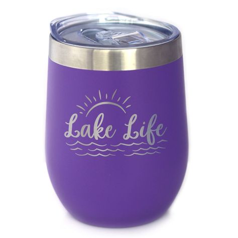 Sip in style with our Lake Life insulated wine tumbler, perfect for those who love lakeside relaxation and unwinding with a glass of vino. This purple 12 oz gem makes a fantastic gift for your favorite lake house host or hostess! Features Double walled insulated design helps keep drinks cool or hot for hours Vacuum sealed thermal insulation makes all drinks portable All Bevvee tumblers come with a spill proof sliding lid to keep up with your busy life Vibrant & colorful powder coating prevents the tumbler from sweating Each tumbler is indivisually gift boxed for safe delievery This 12 oz tumbler is etched (not printed) in our shop in Northern Colorado so the saying will never wear off Lake House Gifts, Drinkware Sets, Northern Colorado, Engraved Tumbler, Camping Mug, Lake House Decor, Stay Cold, House Gifts, Great Housewarming Gifts