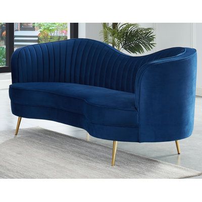 Upholstered in soft fabric with gold metal legs. The seat cushion is medium-firm. The back is curved for a more artistic design with tonal piping edges for the classic look. Fabric: Blue Velvet Blue Velvet Sofa Living Room, Mini Living Room, Curved Seating, Curved Sofas, 1920s Speakeasy, Velvet Sofa Set, Mid Century Modern Loveseat, Art Deco Contemporary, 3 Piece Living Room Set