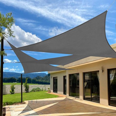 PRICES MAY VARY. Material: Made of 185 gsm UV-protected high-density polyethylene (HDPE) shade fabric; features strong stitched seams; durable stainless steel D-rings in each corner for easy attachment UV Blockage: Blocks up to 95% of harmful UV rays; breathable fabric reduces heat without trapping hot air; protects skin from direct sunlight exposure Breathable Design: Allows cooling breezes and light through; lets rain drain to prevent pooling; not waterproof; install at a 30-degree angle for b Sun Sails, Triangle Shade Sail, Triangle Sun Shade, Sail Canopies, Backyard Shade, Sun Shade Sail, Sun Sail Shade, Shade Cloth, Shade Sail