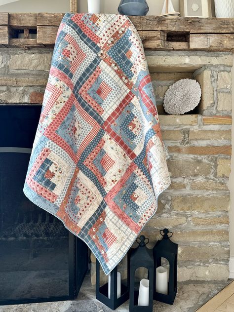 We love a vintage style quilt! 🩵⁠ ⁠ Sara Brown @sarabquilts paired the sun-washed, Americana vibes of Lisa Audit's new Countryside line with Helen Philipps Design’s Vintage Log Cabin quilt pattern. The delicate red, whites and blues also make a perfect Fourth of July quilt! 🇺🇸  ⁠ ⁠ For more photos and tips on how to make, be sure to check out our blog! Countryside fabric is available online and in shops now. Fourth Of July Quilt, Suttons Bay Michigan, Courthouse Steps Quilt, Americana Quilt, Vintage Log Cabin, Sara Brown, Log Cabin Patchwork, Cowboy Quilt, Quilted Pillows