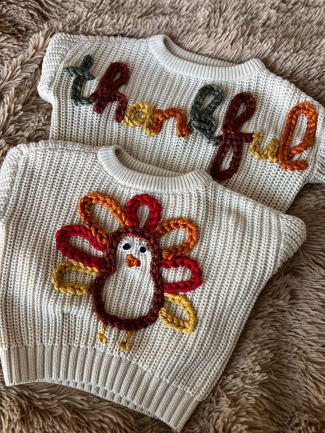 Baby Thanksgiving sweater, kids Thanksgiving sweater, fall sweater for kids, kids fall sweater, kids' fall sweater, Thanksgiving sweater Thanksgiving Embroidery Designs For Kids, Pumpkin Embroidery Sweater, Yarn Embroidered Sweater, Embroidered Knit Sweater, Embroidery Sweater Ideas, Sweater Embroidery Ideas, Embroidered Sweater Diy, Embroidery Sweater Diy, Embroidery Sweaters