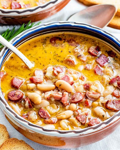 Here's my version for a delicious Tuscan Bean Soup that's loaded with bacon, smoked sausage and lots of beans, comfort food at its finest. #tuscan #beansoup #recipe Beans And Ham Soup, Beans And Ham, Tuscan White Bean Soup, Tuscan White Bean, Tuscan Bean Soup, Tuscan Soup, Bean Soup Recipe, Jo Cooks, Fall Soup Recipes