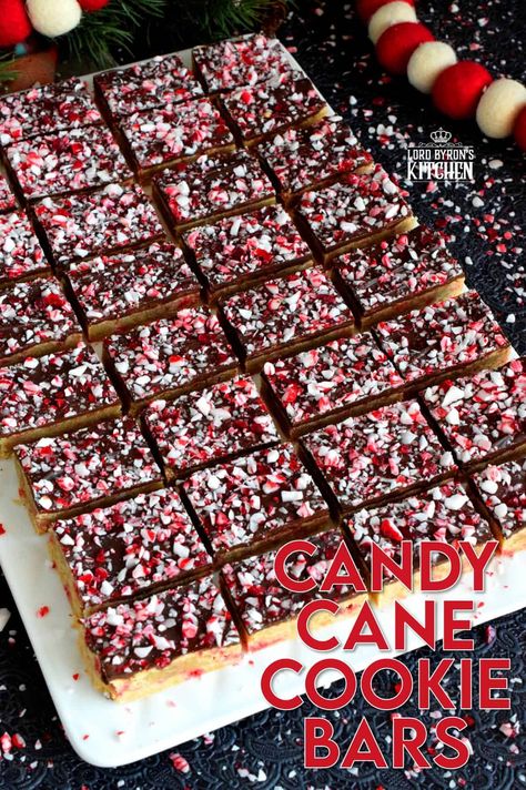 Soft and moist Candy Cane Cookie Bars, which are baked in a sheet pan, then smeared with melted chocolate, and topped with more crushed candy canes, is bound to be a new holiday favourite! These make holiday baking fun and easy! #candycane #cookies #cookiebars #christmas #holiday #baking Candy Cane Cookie, Candy Cane Recipe, Christmas Cookie Bars, Cookie Bars Easy, Christmas Cookie Recipes Holiday, Blueberry Breakfast Cake, Candy Cane Cookies, Blueberry Breakfast, Christmas Candy Recipes