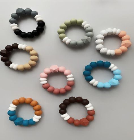 Teething ring Double Hand-made from food silicone beads. Can be frozen, boiled, and sterilized. 8 Colours combinations: blue-dark blue, grey-black, green-grey, apricot-white, red-black, rose-red, beige-black, orange-blue. Food silicon beads, free of BPA. CHF 14.99 Teething Ring, Silicone Beads, Wooden Toys, Live Lokai Bracelet, Color Combinations, Red Roses, Green And Grey, Black And Red, Beads