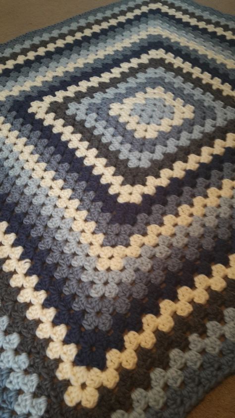 Giant Granny Square blanket using Twilleys Freedom Wool in Pearl, Moonlight, Misty Morning, Ice Blue and Slate. Pattern from Bunny Mummy. http://bunnymummy-jacquie.blogspot.co.uk/2011/10/how-to-crochet-granny-square.html Blue Crochet Granny Square Blanket, Blue And Grey Crochet Blanket, One Big Granny Square Blanket, Crochet Blue Blanket, Granny Square Blanket Aesthetic, Granny Square Color Combinations Ideas, Granny Square Blanket Blue, Blue Granny Square Blanket, Big Granny Square Blanket