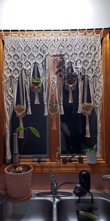 Macrame Plant Hanger Kitchen Window, Macrame Over Curtain, Macrame Wall Hanging With Plants, Kitchen Macrame Curtain, Macrame Curtain Plant Hanger, Macrame Plant Curtain, Creative Plant Hangers, Window Macrame Plant Hanger, Macrame Window Curtain Pattern