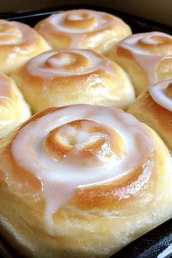 These homemade honey buns are soft, buttery, and bursting with honey-sweetened goodness! Filled with a luscious honey butter filling and topped with a silky honey glaze, they’re perfect for breakfast or dessert. Ready in under an hour, this recipe is a must-try. Get the full instructions now! Beginner Dessert Recipes, Honey Buns Homemade, Honey Rolls Recipe, Honey Bun Cheesecake, Butter Roll Dessert Recipe, Honey Buns Recipe, Homemade Honey Buns, Honey Recipes Dessert, Woolworth Cheesecake Recipe