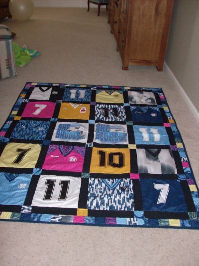 I took all the softball jerseys from my granddaughter's years of playing softball and made her a huge quilt from them. She cherishes this quilt and it brings back lots of memories for her. Volleyball Quilt, Softball Quilt, Soccer Quilt, Brooke Williams, Jersey Blanket, Soccer Ideas, Softball Tournament, Soccer Time, Softball Crafts