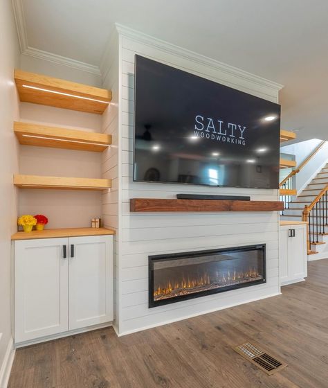 Share your electric fireplace project for #NationalSwapIdeasDay and help someone out in need of inspo! 🤩 Check out @saltywoodworking_ for some brilliant design ideas! #luxuryroom #interiordesign #housegoals #fireplaceideas #livingroomgoals #livingroomideas #interiordesign #electricfireplace #touchstonehomeproducts Building Electric Fireplace Wall, Electric Fireplace Built In Cabinets, Electric Fireplace And Built Ins, Built Out Electric Fireplace Wall, Built In Shelves Living Room Electric Fireplace, Electric Fireplace Ideas With Tv Built Ins, Basement Electric Fireplace, Fireplace With Cabinets, Fireplace Basement