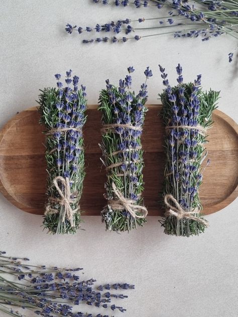 Organic Lavender and Rosemary Smudge Sticks from the Mediterranean Coast, featuring premium French lavender flowers.  Handcrafted with care, these smudge sticks are a perfect blend of the aromatic tranquility of lavender and the purifying energies of rosemary.  Sourced directly from the sun-drenched shores of the Mediterranean, our smudge sticks are made with 100% organic and natural ingredients, ensuring a pure and potent experience. Each stick is carefully bound with natural twine, combining t Lavender Plant Aesthetic, Lavender Smudge Sticks, Rosemary Smudge, Farm Market Ideas, Medicinal Herbs Remedies, Lavender Basket, Yoga Room Design, Lavender And Rosemary, Lavender Crafts