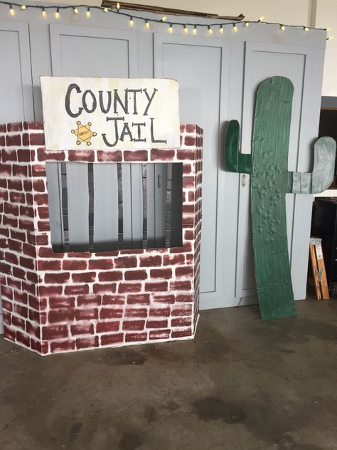 County Jail Decoration With Cactus Jail Party Decorations, Wild West Vbs Snacks, How To Make A Jail Cell Prop, Jail Halloween Decorations, Western Theme Door Decorating Ideas, Diy Jail Cell Prop, Jail Themed Party Ideas, Diy Jail Cell, Wild West Vbs Decoration