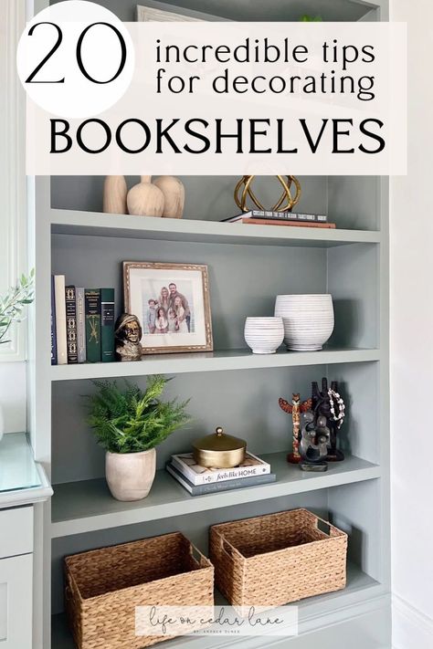 Unlock the secrets of Styling a Bookcase with our blog post on Creative Bookshelf Styling Ideas. Discover expert tips on How To Style Open Bookshelves for a visually appealing and organized display. Transform your space with Creative Bookshelves that showcase your personality and taste. Get inspired to revamp your bookcase like a pro. Library Shelf Decorating Ideas, Living Room Shelf Design Ideas, Styling Book Shelves Built Ins, Built In Decor Ideas, Ikea Bookcase Styling, Fireplace Bookshelf Decorating Ideas, Decorate Office Bookshelf, Trendy Bookshelf Decor, Bookshelves With Picture Frames