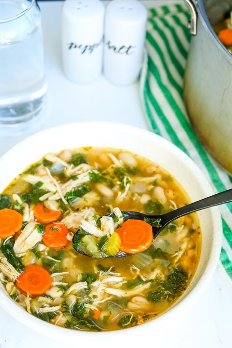 Easy Chicken White Bean Soup with Kale and Lemon Chicken Kale White Bean Soup, Simple Baked Apples, Chicken White Bean Soup, Chicken And Kale Soup, White Bean Soup With Kale, Roasted Cabbage Recipes, Bean Soup With Kale, White Bean And Kale Soup, Baked Apples Recipe