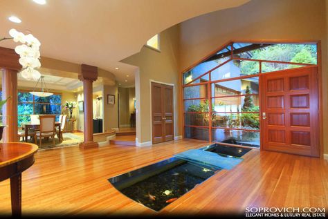 glass floor covering only part of fish pond, built into wood floor Indoor Fish Pond, Foyer Designs, Indoor Pond, Aquarium Glass, Indoor Water Features, Koi Fish Pond, Pond Design, Fish Aquarium, Fish Ponds