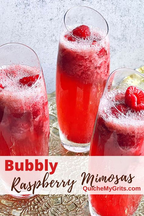 Three glasses of raspberry mimosas with sorbet and raspberries on top of pink champagne. Valentines Mimosa Bar, Valentine Mimosa, Raspberry Mimosa Recipe, Valentines Day Mimosa, Valentines Mimosa, Pink Mimosas, Pink Mimosa Recipe Champagne, Valentines Champagne Drinks, Raspberry Lemonade Mimosa