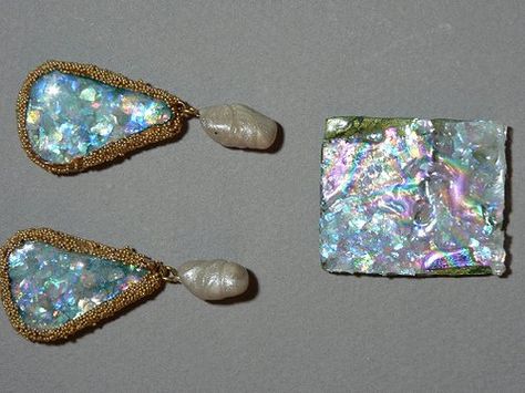 https://flic.kr/p/6nvAja | Artist SherryBatDPL. Polymer Clay Faux Opals | These pieces were made with Donna Kato's technique using translucent Liquid Kato Clay and Grummen iridescent flakes (meant for papermaking.) I used an "oil slick" Jones Tones foil, baked onto liquid clay, as the base for more color. The gold trim on the earrings is made from those holeless bitsy glass beads. The pearls are faux, too. Liquid Polymer Clay, Polymer Canes, Liquid Clay, Opal Art, Jewelry Tips, Poly Clay, Clay Work, Polymer Earrings, Clay Inspiration