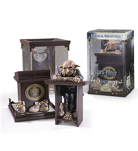 The Noble Collection Harry Potter Magical Creatures: No.10 Gringotts Goblin | Intricately detailed and painted.Removable cover and creature.Display case measures approximately 7 inches x 4.25 inches.Officially authorized by Warner Brothers. | Affiliate Harry Potter Figures, Harry Potter Magical Creatures, Harry Potter Characters Names, Gringotts Bank, Noble Collection Harry Potter, Harry Potter Toys, Noble Collection, Character Cosplay, Harry Potter Shop