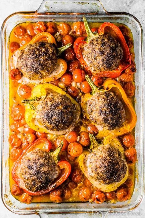 SAVE FOR LATER! Meatball Stuffed Peppers are an easy to make one-pan dinner recipe. Bell peppers are stuffed with (grain-free!) giant meatballs and roasted in the oven with cherry tomatoes. They're delicious! #theendlessmeal #meatballs #stuffedpeppers #stuffedbellpeppers #easydinnerrecipes #casserole #healthydinnerrecipes #stuffedpeppersrecipes #giantmeatballs #paleomeatballs #paleo #glutenfree #whole30 #dairyfree #pork #beef #meatballrecipes Meatball Stuffed Peppers, Meatballs And Peppers, Omnivore Recipes, Recipe Peppers, Giant Meatballs, Veggie Casserole Recipes, Pizza Meatloaf, One Pan Dinner Recipes, Wood Pizza