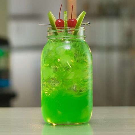 SWAMP WATER 2 oz. (60ml) Tequila  3 oz. (90ml) Sour Apple Pucker  3 oz. (90ml) Melon Liqueur  2 oz. (60ml) Sweet & Sour Mix  3 oz. (90ml) Lemon Lime Soda Splash Blue Curaçao Garnish: Lime/Cherry Skewer  PREPARATION 1. Fill your glass or pitcher with ice and pour in tequila, sour apple pucker, melon liqueur, sweet & sour mix, and lemon lime soda. Stir well.  2. Add a splash of blue curaçao and garnish with a lime and cherry skewer.  DRINK RESPONSIBLY! Sour Apple Pucker Drinks, Swamp Water Drink, Apple Pucker Drinks, Samhain Party, Tipsy Bartender Recipes, Tequila Sour, Party Punch Recipe, Jungle Juice Recipe, Sour Apple Pucker