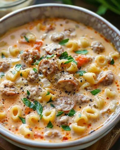 Indulge in our Creamy Parmesan Italian Sausage Soup, a savory blend of Italian sausage, creamy broth, and rich Parmesan cheese. Lobster Cream Sauce, Sausage Soup Recipes, Alfredo Lasagna, Italian Sausage Soup, Roasted Strawberries, Creamy Parmesan, Sausage Soup, Pasta Soup, Sauteed Vegetables