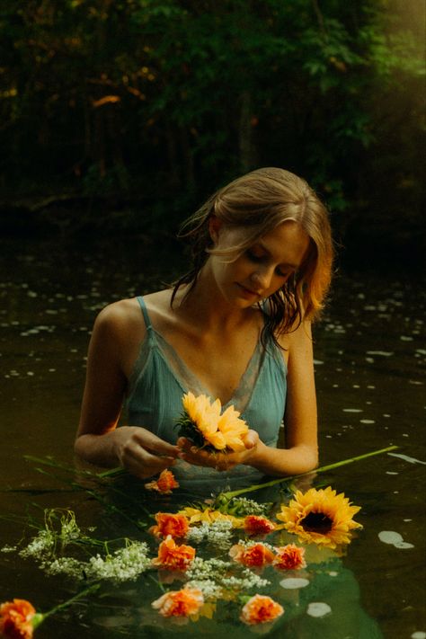 Photoshoot Ideas Cloudy Day, Water And Flower Photoshoot, Senior Pictures Water Ideas, Sitting In A Flower Field, Art Photo Ideas, Sheet Music Senior Pictures, Ad Poster Ideas, River Photoshoot Ideas Nature, Cute Senior Photo Ideas