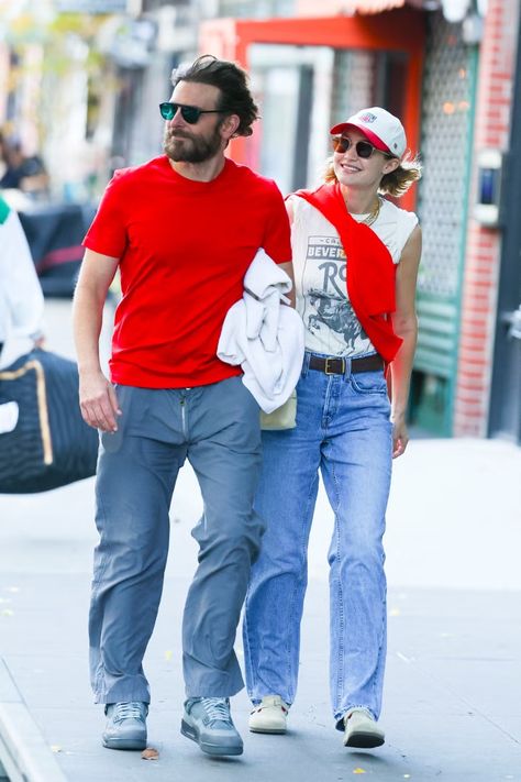 Gigi Hadid and Bradley Cooper coordinated in red and white for their most recent date. Gigi wore a graphic white top from Re/Done paired with straight-leg jeans from Cotton Citizen. She added a pop of color with a red cashmere cardigan from her own brand, Guest In Residence. Tap to shop her look. #gigihadid #gigihadidstyle #gigihadidoutfits #hadidsisters #hadidstyle #hadidscloset #celebrityfashion #celebrityoutfits Loro Piana L19, Outfits In New York, Red White Blue Outfit, Guest In Residence, Outfits Nyc, Gigi Hadid Outfits, Gigi Hadid Style, Pop Of Red, Coordinating Outfits