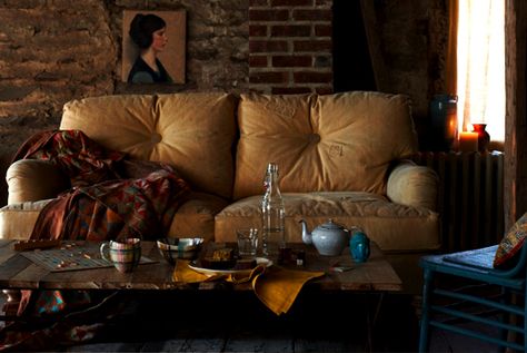 textures Sherlock Holmes Room, Couch Aesthetic, Messy Table, Table Couch, Bohemian Interiors, Grey Dining Room, Cozy Couch, Comfy Couch, Exposed Brick Walls