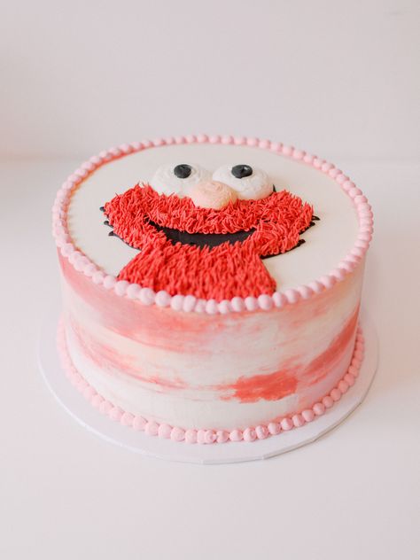 Watercolor Elmo cake Elmo’s Onederful World, Simple Elmo Cake, Elmo Smash Cake Girl, Simple Sesame Street Cake, Elmo Birthday Cake Girl, Elmo 1st Birthday Party Girl, Elmo Cake Girly, Elmo Birthday Party Girl, Girly Elmo Birthday Party