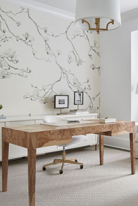 Brad Ramsey reimagines this office design with soft neutral tones and the delicate design of our Blossom collection! Discover the collection and order a sample. #PhillipJeffries #wallcovering #wallpaper #interiordesign #homedecor #luxuryhome #luxurydecor #interiorstyling #interiors #decor #interiordecor #luxurydesign #neutraldecor #neutralhome #neutraldesign #doingneutralright #office #officedesign #officedecor #homeoffice #homeofficedesign #homeofficedecor #floralwallpaper #flowerwallpaper Wallpapered Home Office, Women Office Wallpaper, Office Interior Design Wallpaper, Home Office Design Wallpaper, Feminine Office Wallpaper, Wallpaper Home Office Inspiration, Transitional Office Decor, Home Office With Wallpaper, Wallpaper Office Ideas