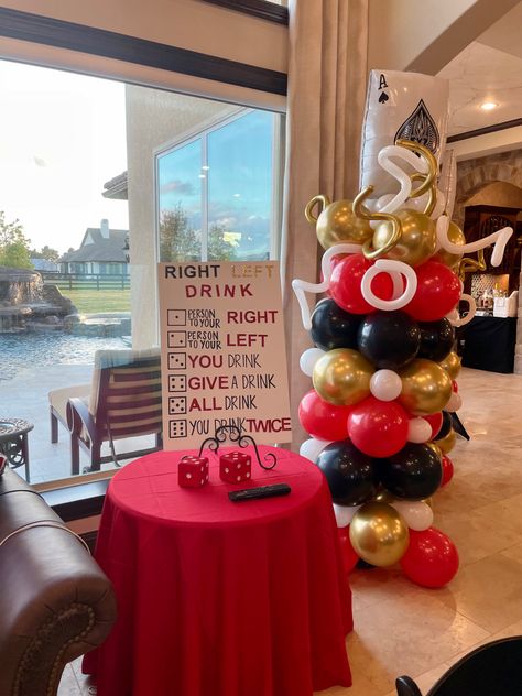 Casino themed party at home #casino #party #gamble # adultpartyideas #casino-party #balloons #partygames Poker Night Birthday Party Ideas, Home Casino Party, Black And White Casino Party, Ace Party Theme, Card Game Theme Party, Vegas Party Centerpieces, Dice Theme Party, Men Casino Party, Gambling Party Theme