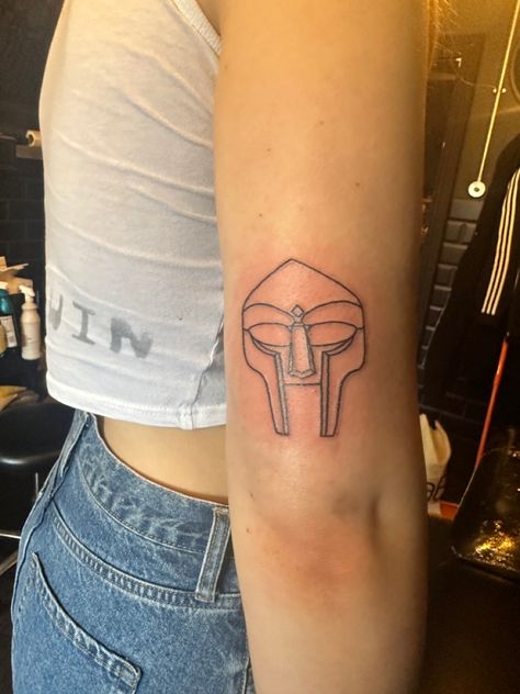 Mf Doom Mask Tattoo, Mf Doom Tattoo, Doom Tattoo, Mf Doom Mask, Pilot Tattoo, Tattoo Catalog, Mf Doom, Mask Tattoo, Clothing Displays