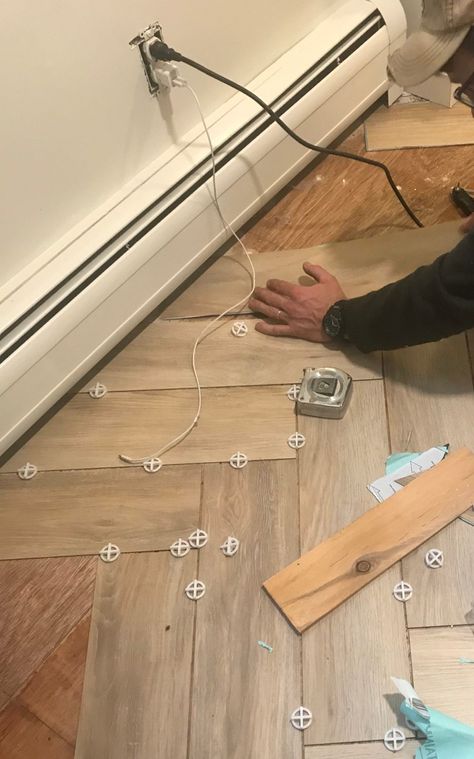 How to Install peel and stick tile in a herringbone pattern Peel And Stick Vynil Floor Tile, Diy Herringbone Floor, Tile Over Tile, Sticky Tile, Farmhouse Life, Herringbone Tile Floors, Floor Makeover, Baseboard Trim, Peel And Stick Wood