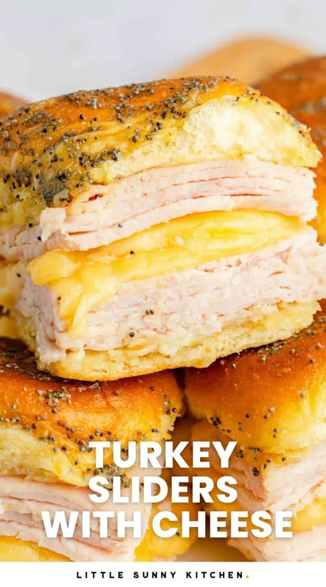 Warm and cheesy turkey sliders with cheese on buttery sweet Hawaiian rolls are irresistibly delicious, and perfect for dinner or parties. Sliders Recipes Turkey, Hawaiian Roll Sandwiches, Cheesy Turkey, Sliders Recipes Hawaiian Rolls, Easy Slider Recipes, Ham And Cheese Sliders, Hawaiian Roll Sliders, Turkey Sliders, Rolled Sandwiches