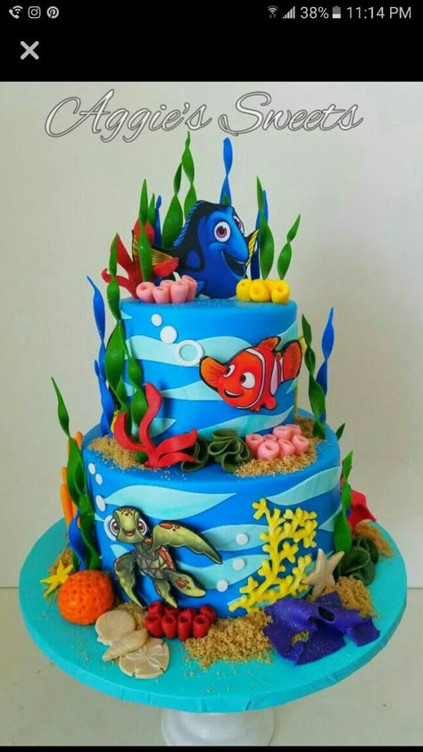 Finding Dory Cake Finding Dory Cake Ideas, Finding Dory Cake Birthday, Finding Nemo 1st Birthday Party Ideas, Nemo Cake Ideas, Dory Birthday Cake, Finding Nemo Decorations, Finding Dory Cake, Dory Cake, Finding Nemo Cake