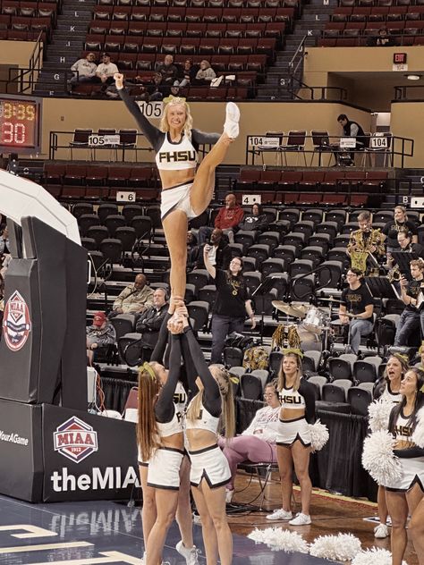 Stunting, heel stretch, college cheer, MIAA, Lib, cheerleading, aesthetic Cheer Leading Aesthetic, Cheerleader Aesthetic Pictures, Cheerleader Aesthetic, Cheer Aesthetic Allstar, Cheer Aesthetic, Highschool Cheer Aesthetic, Cheerleading Worlds Aesthetic, College Cheer, School Goals