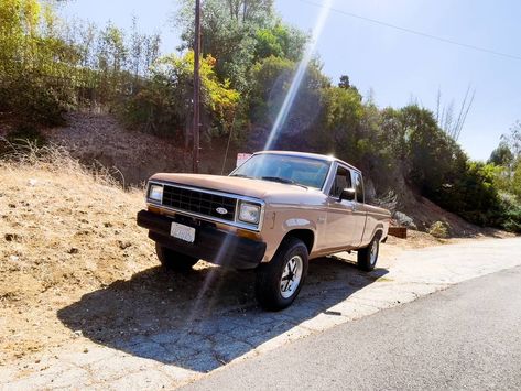 Production of the compact Ford Ranger started for the 1983 model year (Ford had an Edsel Ranger and later a F-Series Ranger trim, but that was just an options package) as the first compact pickup truck designed and released by North American Ford. Unless you count the original Model T pickup as a compact, but I'm getting ahead of myself. Anyway, the OG Ford Ranger was produced from 1982 through 1992 on a chassis #Murica #4X4 #ExtCab #Ford #Ranger #STX Compact Pickup Truck, Compact Pickup Trucks, Bronco Ii, Small Trucks, Truck Design, Model T, Car Shop, Pickup Truck, Valve Cover